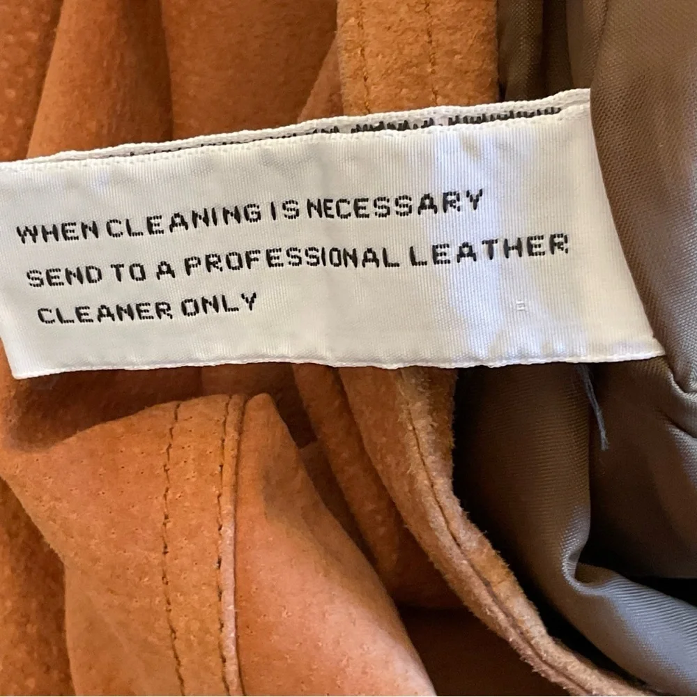 True vintage suede—real leather with clean tailoring an earlier designer era.